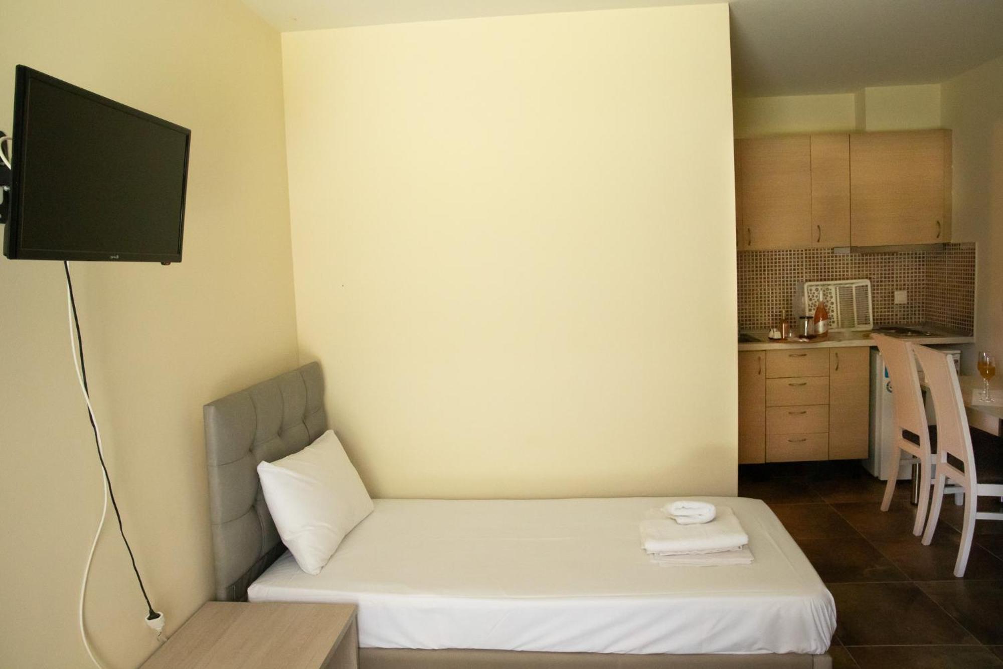 Sunset Inn Kryopigí Rom bilde
